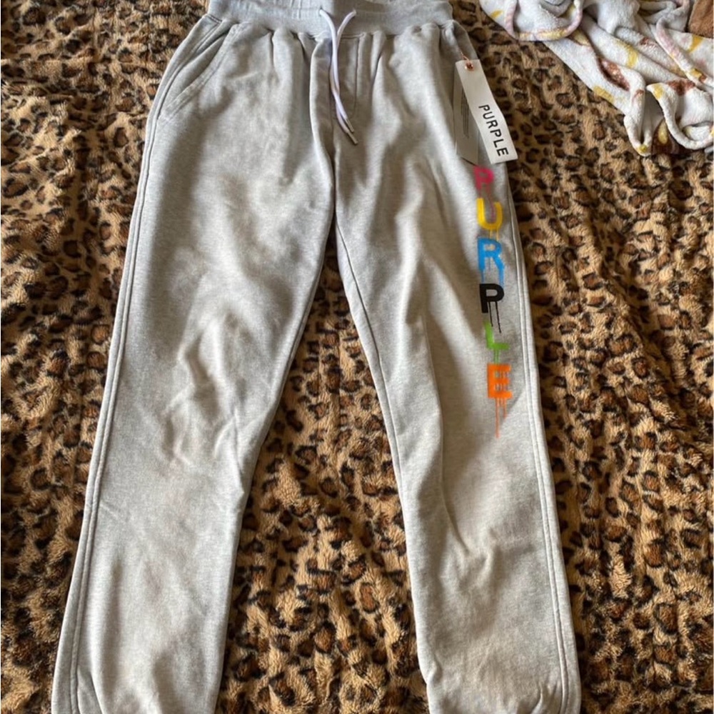 Purple brand, grey sweatpants with multicolor logo